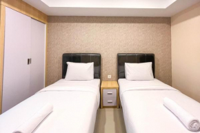 Simply Look Studio at 21st Floor De Prima Apartment By Travelio